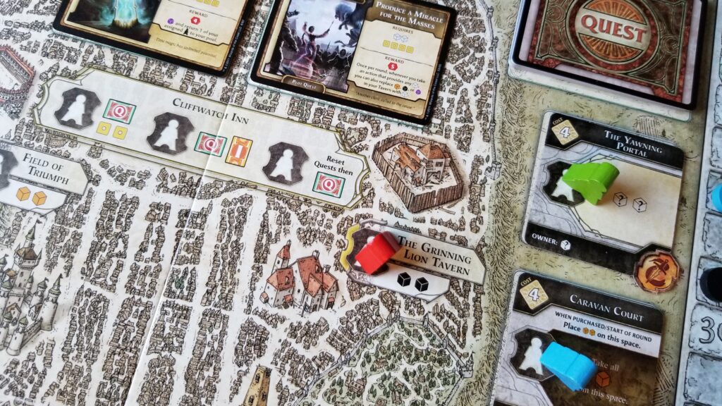 The game board depicts a map of Waterdeep with craggy, medieval streets and buildings